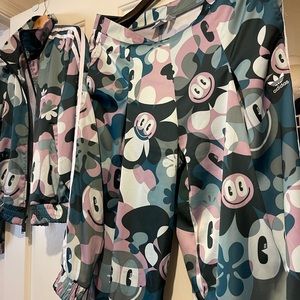 Adidas multi colored track suit size Large